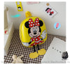 Sac à dos Disney pour enfant - Mickey ou Minnie jaune et avec un fond une table avec des détails