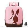 Sac à dos pour enfants illustré d'un adorable animal coloré rose avec un fond blanc