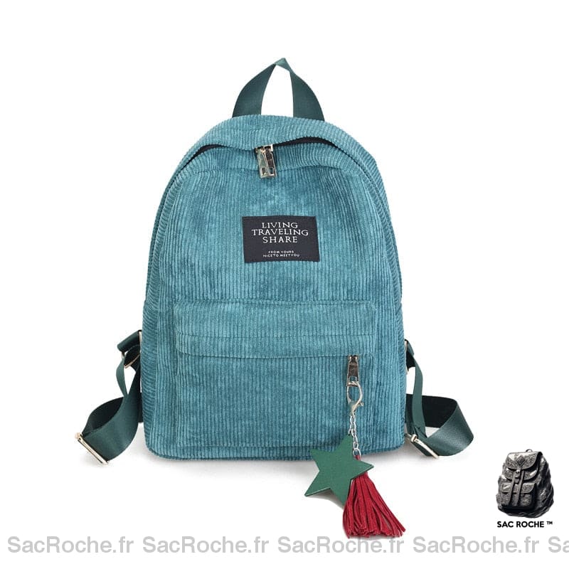 Sac à dos femme élégant en velours cotelé bleu avec un fond blanc