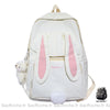 Sac à dos oreilles de lapin blanc et rose avec un fond blanc