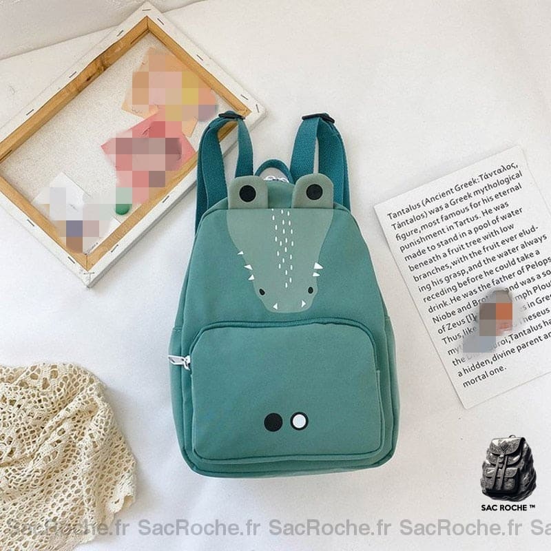 Sac à dos aux motifs d'animaux grande capacité vert avec un fond blanc, un cadre et un poster blanc avec des lettres noir