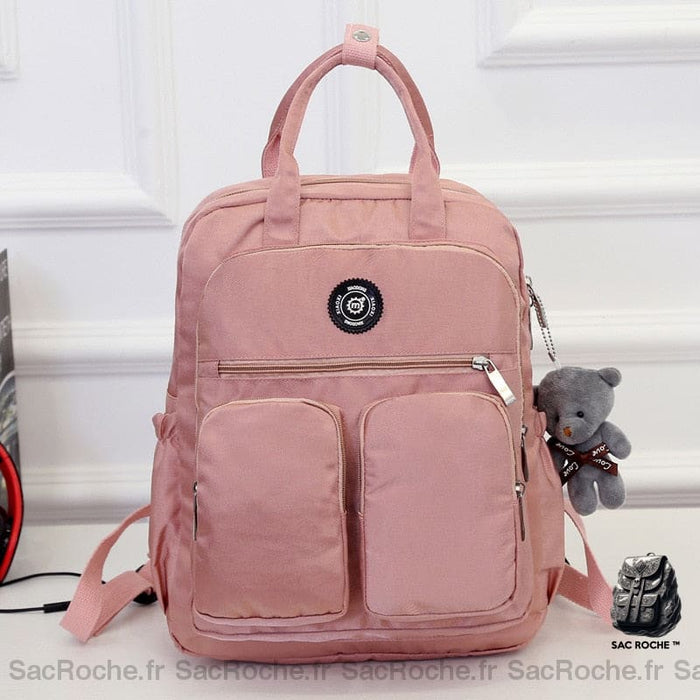 Sac à dos femme en nylon rose avec un fond blanc