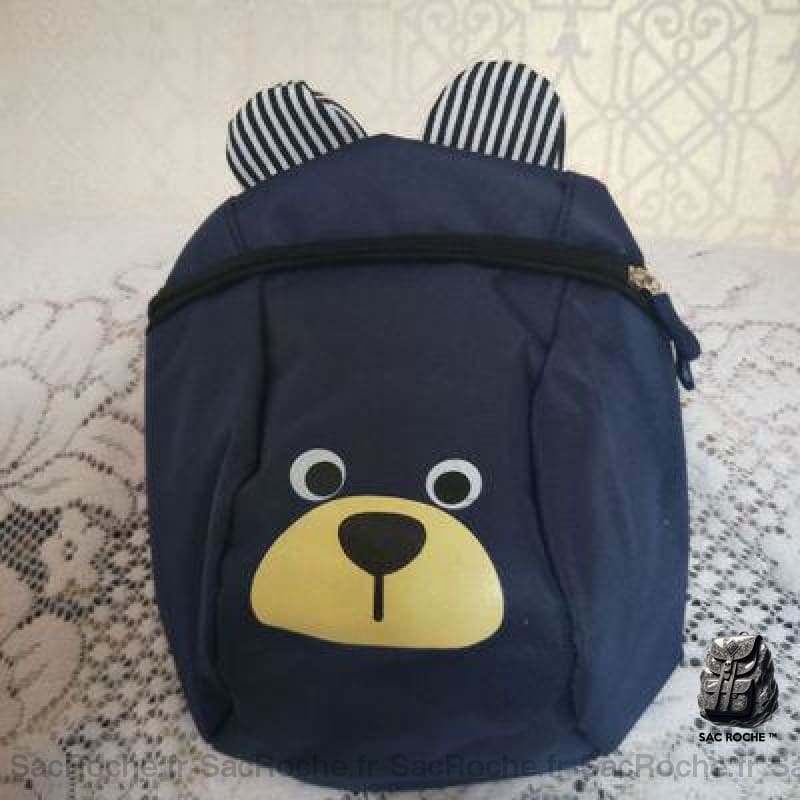 Sac à dos ourson pour enfants bleu avec un fond avec des designs