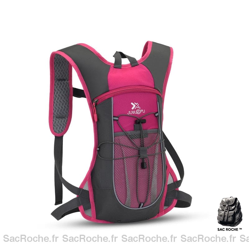 Sac à dos ultraléger pour le ski et les sports d'hiver gris et rose avec un fond blanc