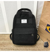 Sac à dos ordinateur femme en velours côtelé noir avec un fond en bois