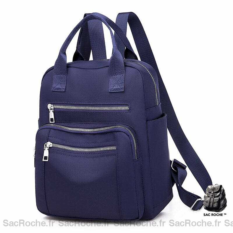 Sac à dos de voyage de grande capacité couleur unie bleu avec un fond blanc