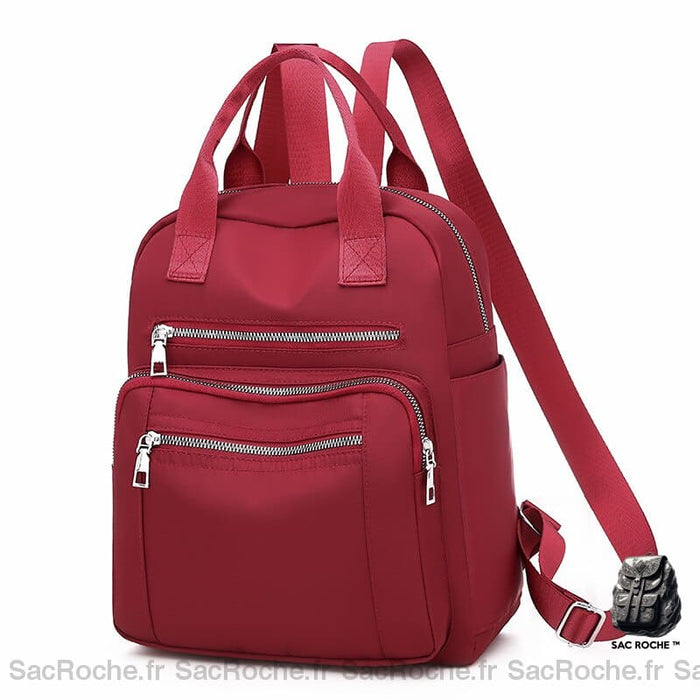 Sac à dos de voyage de grande capacité couleur unie rouge avec un fond blanc