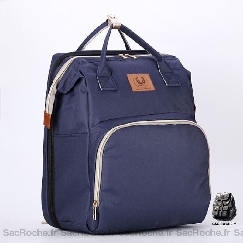 Sac à langer bébé transformable bleu avec un fond blanc