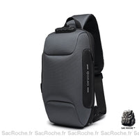 Sac à bandoulière antivol gris avec un fond blanc