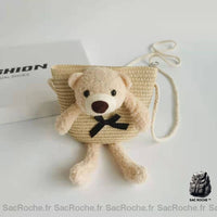 Sac à bandoulière en paille colorée avec ourson beige avec un fond blanc