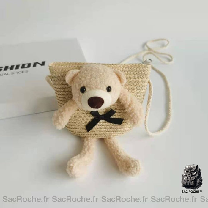 Sac à bandoulière en paille colorée avec ourson beige avec un fond blanc