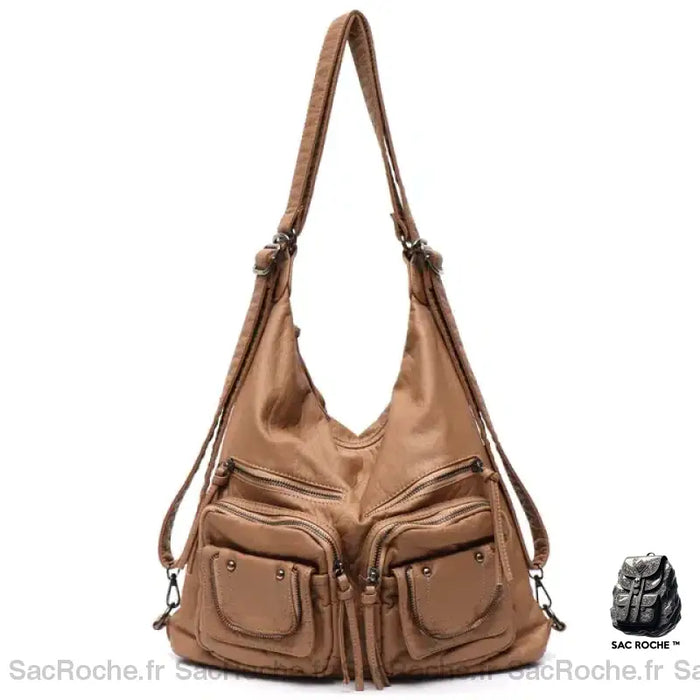Sac à bandoulière en similicuir marron avec un fond blanc