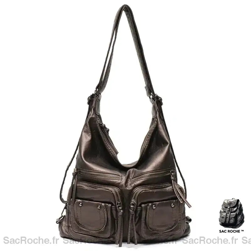 Sac à bandoulière en similicuir marron avec un fond blanc