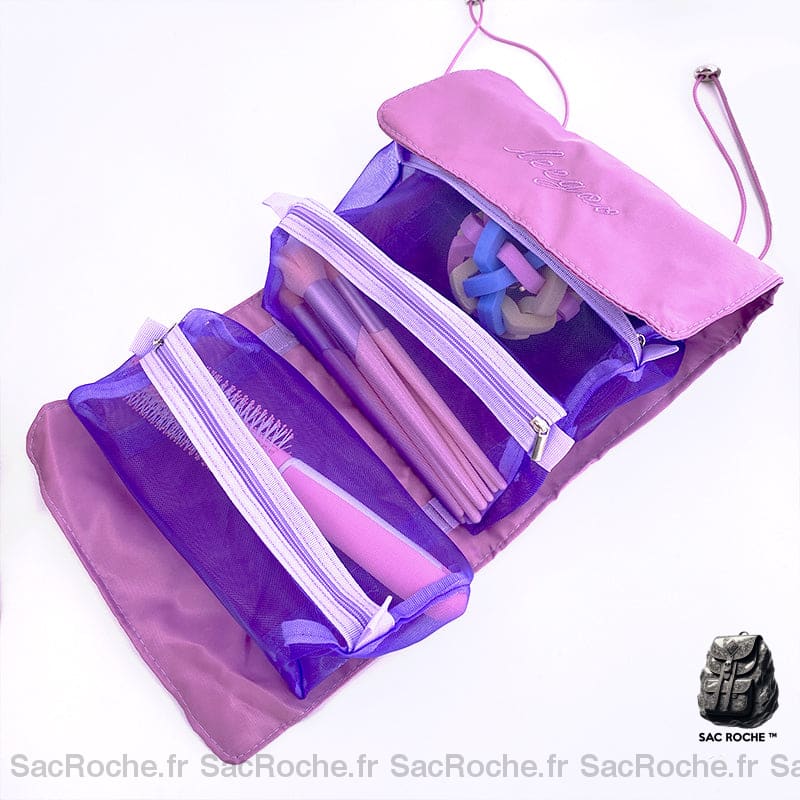Sac à cosmétiques multipoches pour femmes rose et violet avec un fond blanc