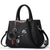 Sac main cuir pompon petit - modèle Noir - Sac Roche ™