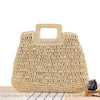 Sac de plage en paille pour femme beige avec un fond blanc