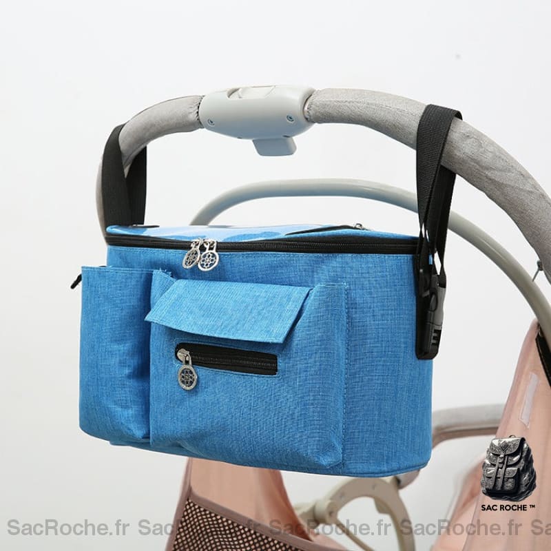 Sac de rangement accessoire pour poussette bébé bleu avec un fond une poussette