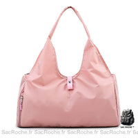 Sac de sport pour femme en nylon rose avec un fond blanc