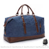 Sac de voyage homme fourre-tout en toile bleu et marron avec un fond blanc