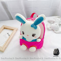Sacs à dos d'école en peluche de lapin pour enfants rose avec un lit blanc